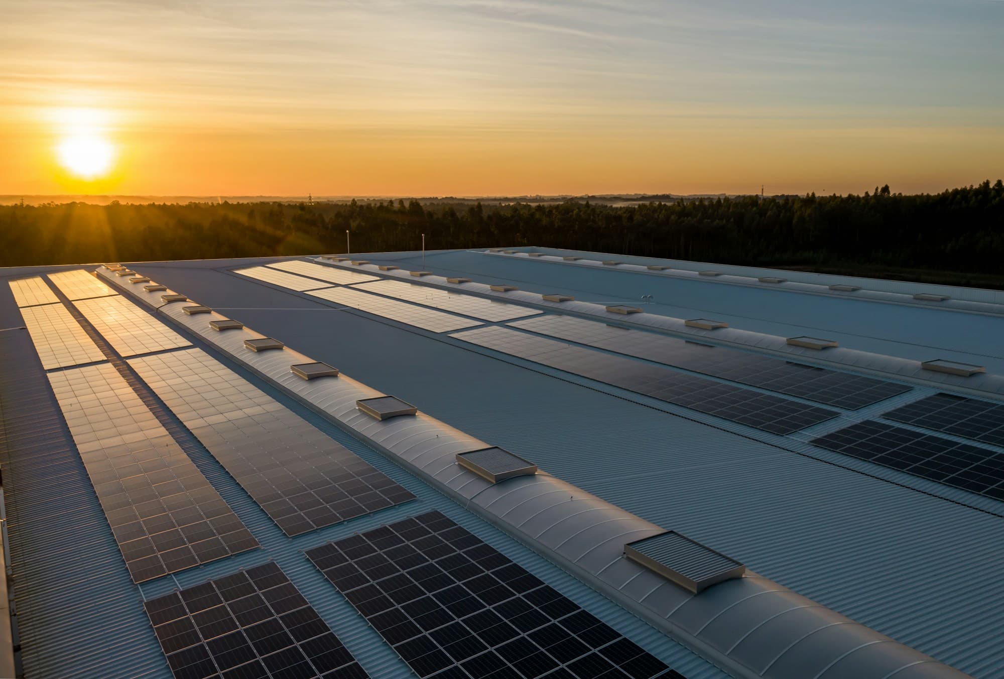 Rooftop solar array at sunrise